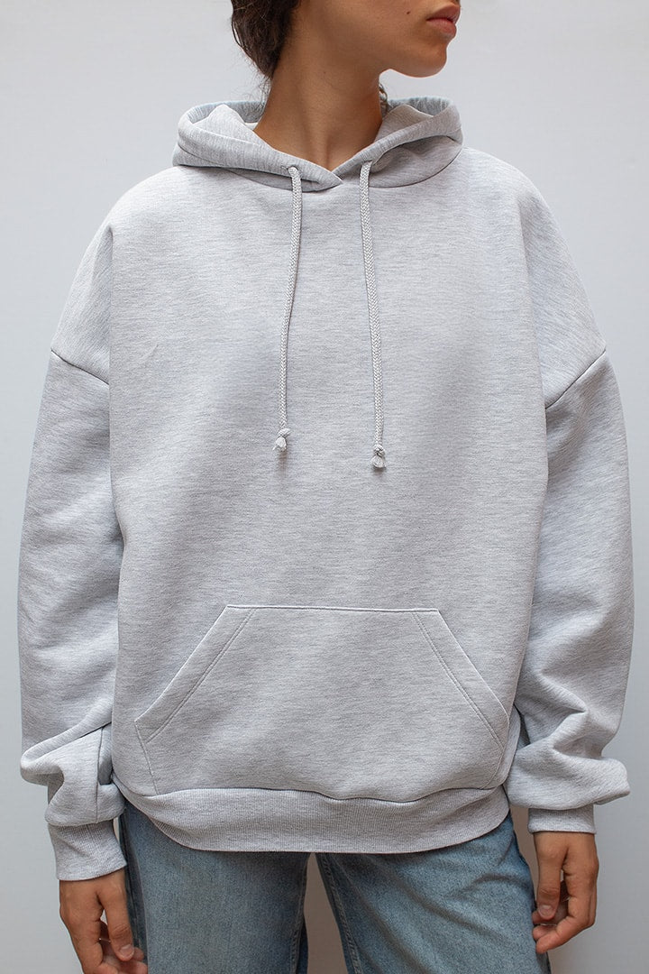 Women's grey hoodie with sequin wing detail on the back
