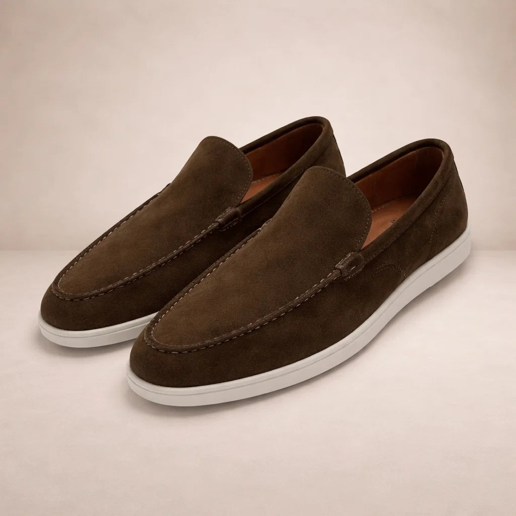 Men's slip-on moc toe loafers with stitched detail and flat light soles