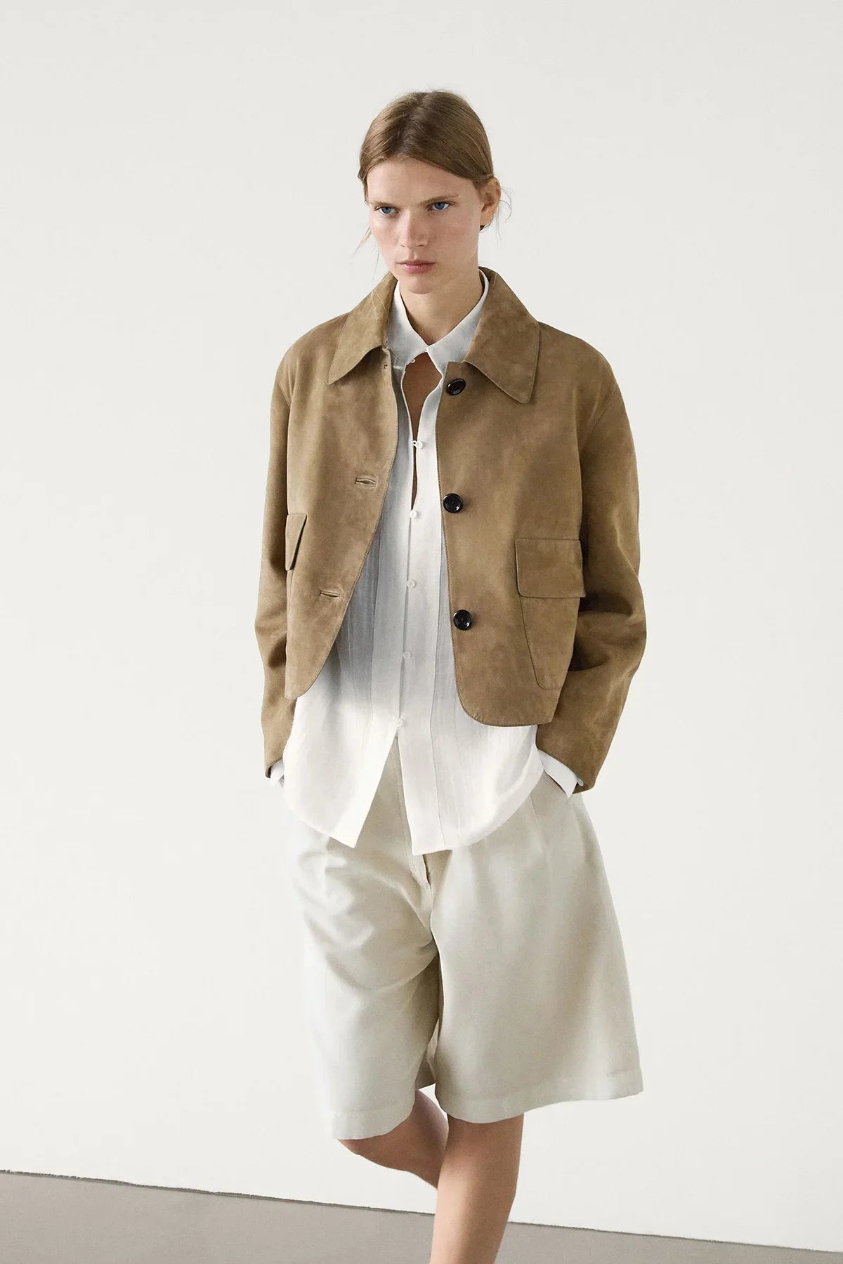 Women's sand cropped jacket with pointed collar, button front and flap pockets