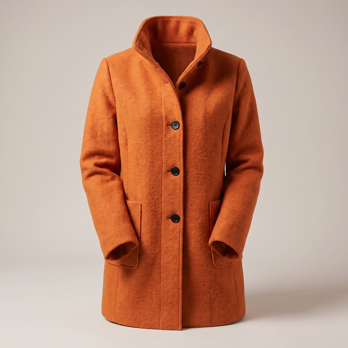 Women's longline coat with raised collar, button front and patch pockets