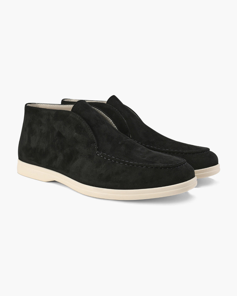 Ankle-height slip-on loafers with round toes and flat soles