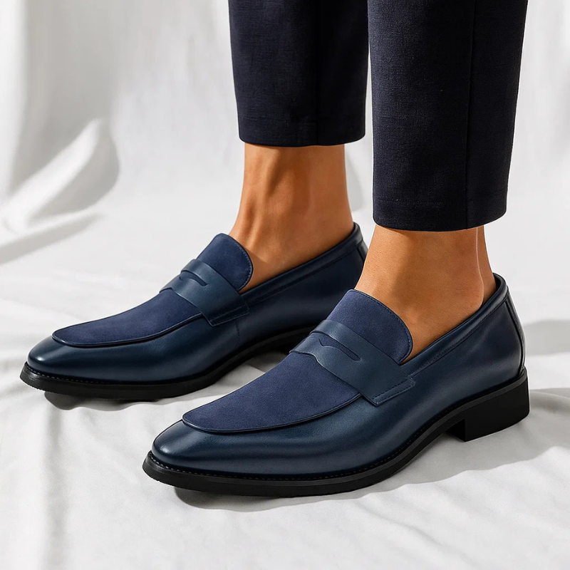 Men's penny loafer with almond toe, low heel and vamp strap