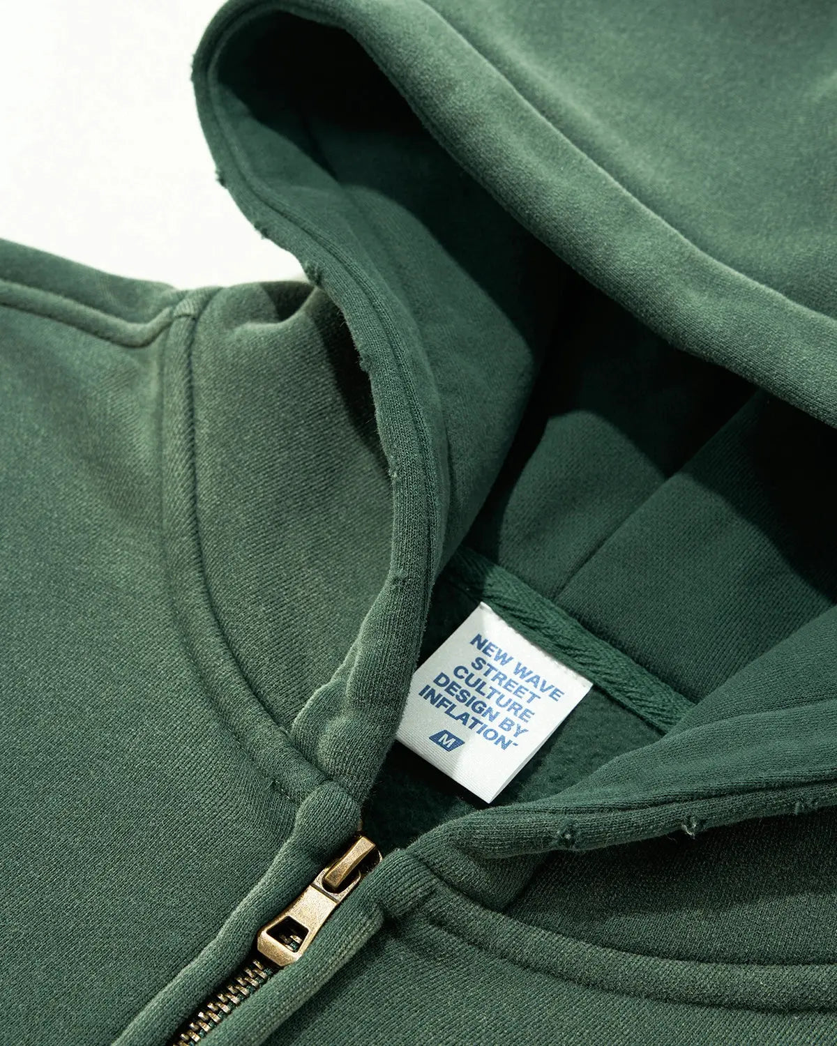 Green washed zip-up hoodie with hood, long sleeves and front pockets