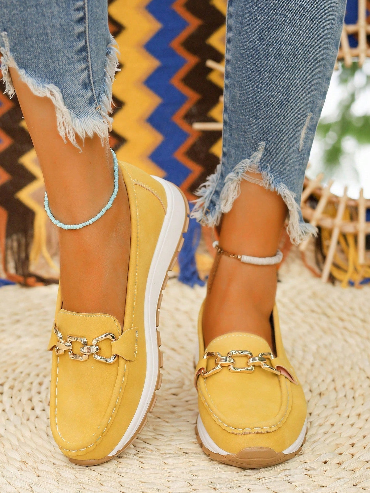 Women's moc toe loafers with chain detail and flat ridged soles