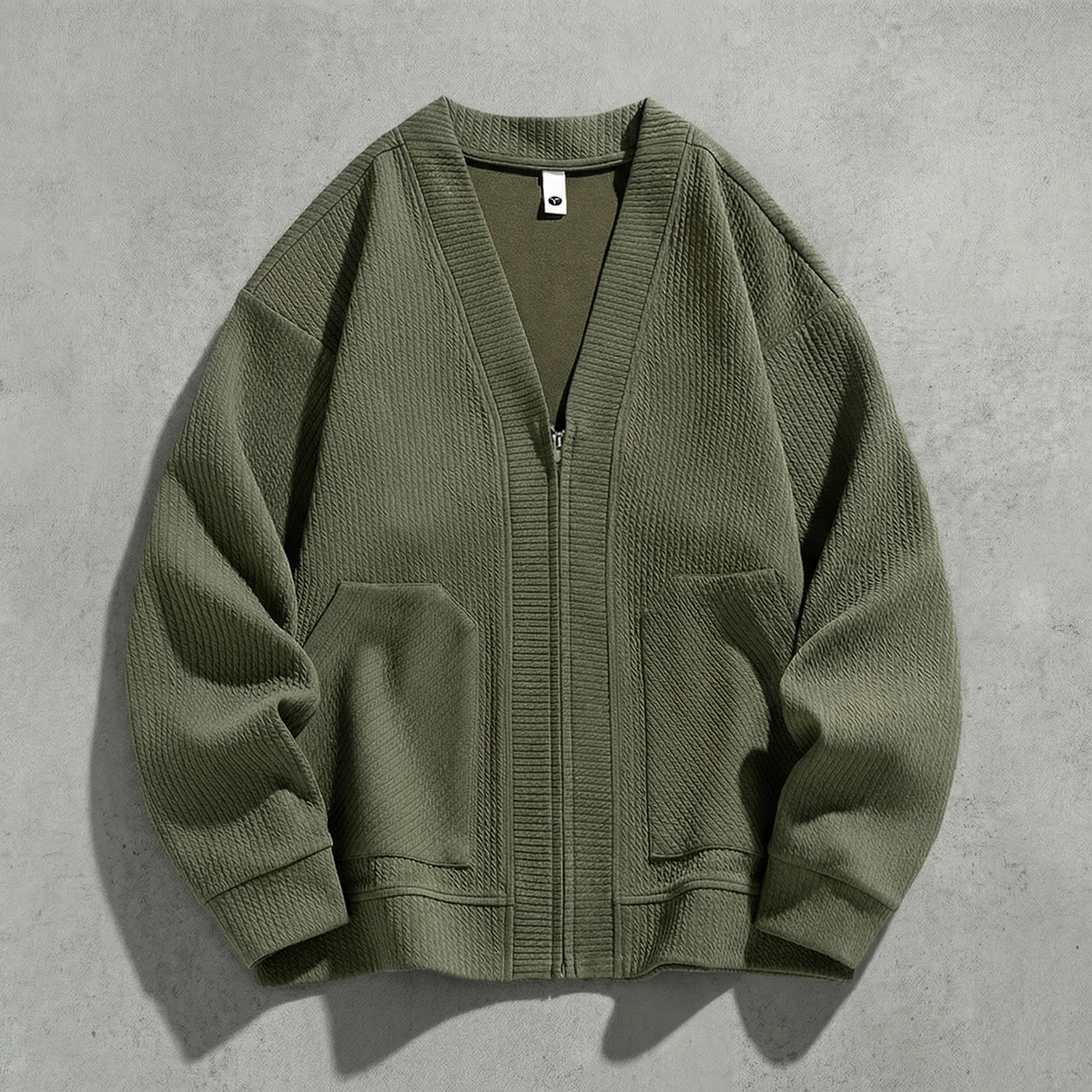 Women's oversized ribbed cardigan jacket with zip front and patch pockets