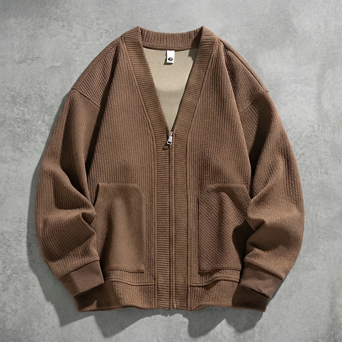 Women's oversized ribbed cardigan jacket with zip front and patch pockets