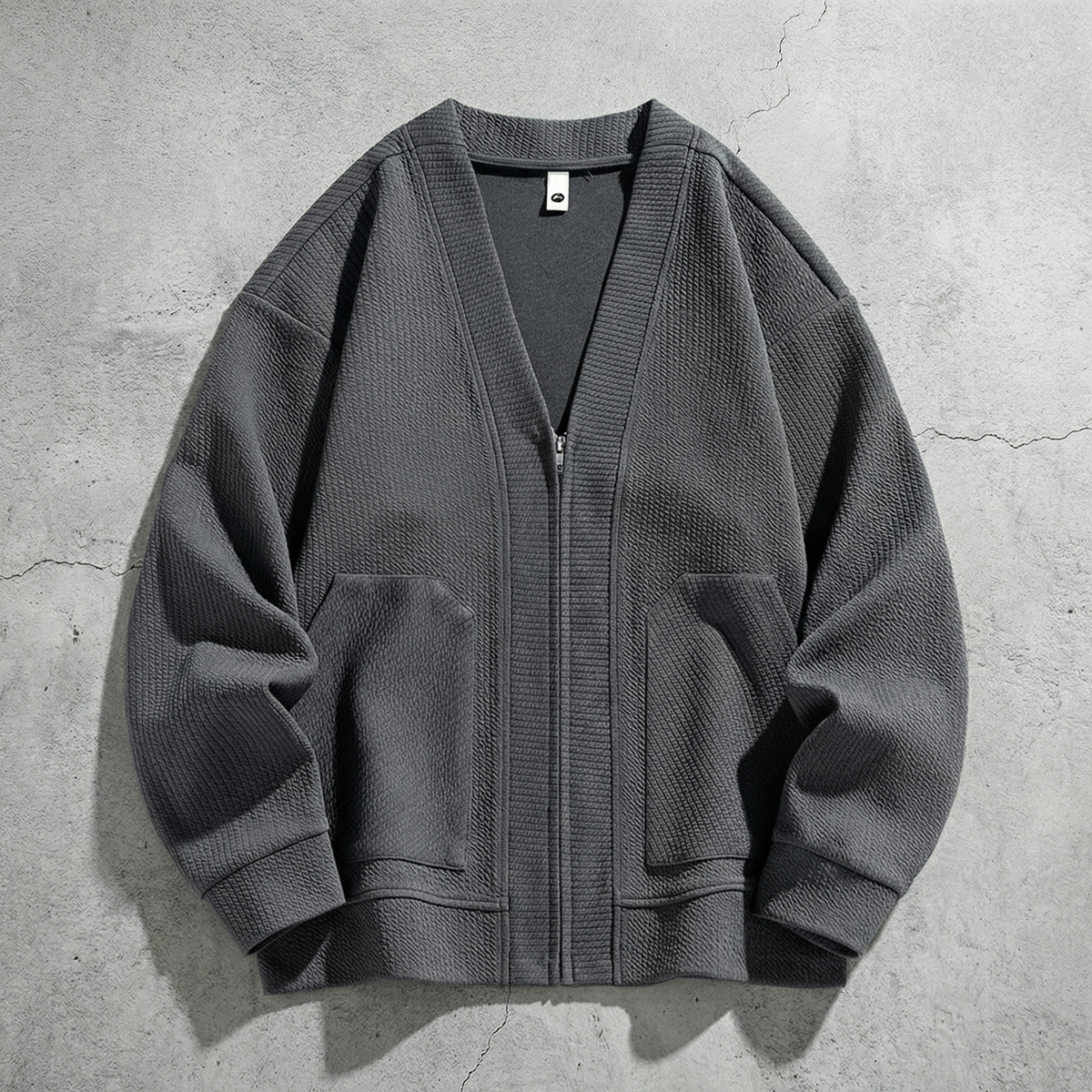 Women's oversized ribbed cardigan jacket with zip front and patch pockets
