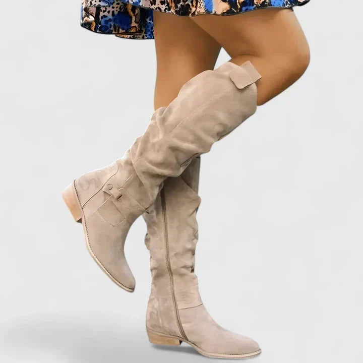 Women's slouch over-the-knee boots with low heels, side zips and strap detailing