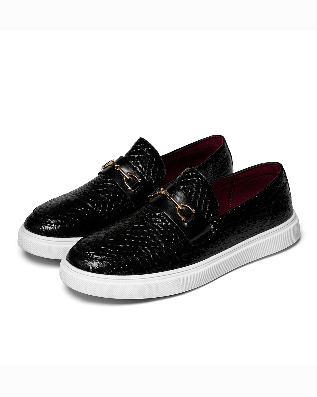 Men's textured slip-on loafers with buckle detail and contrasting flat soles
