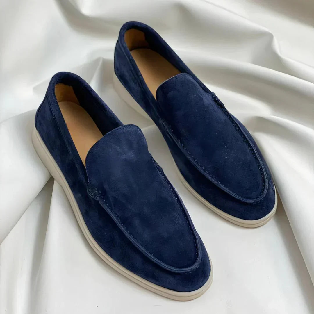 Men's slip-on loafers with almond toes, stitched detailing and flat contrasting soles