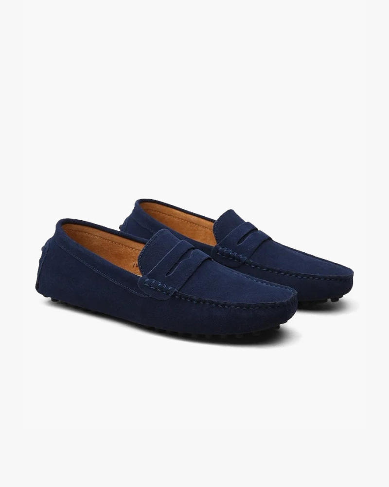 Men's penny loafers with moc toes, stitched trim and low flat soles