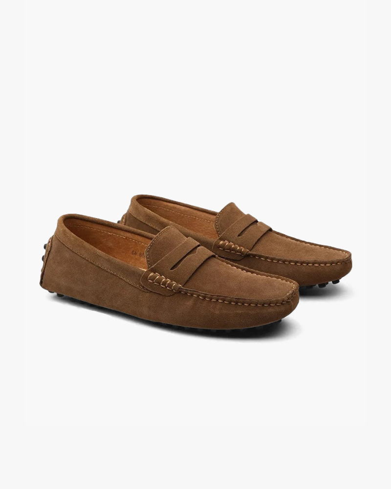 Men's penny loafers with moc toes, stitched trim and low flat soles