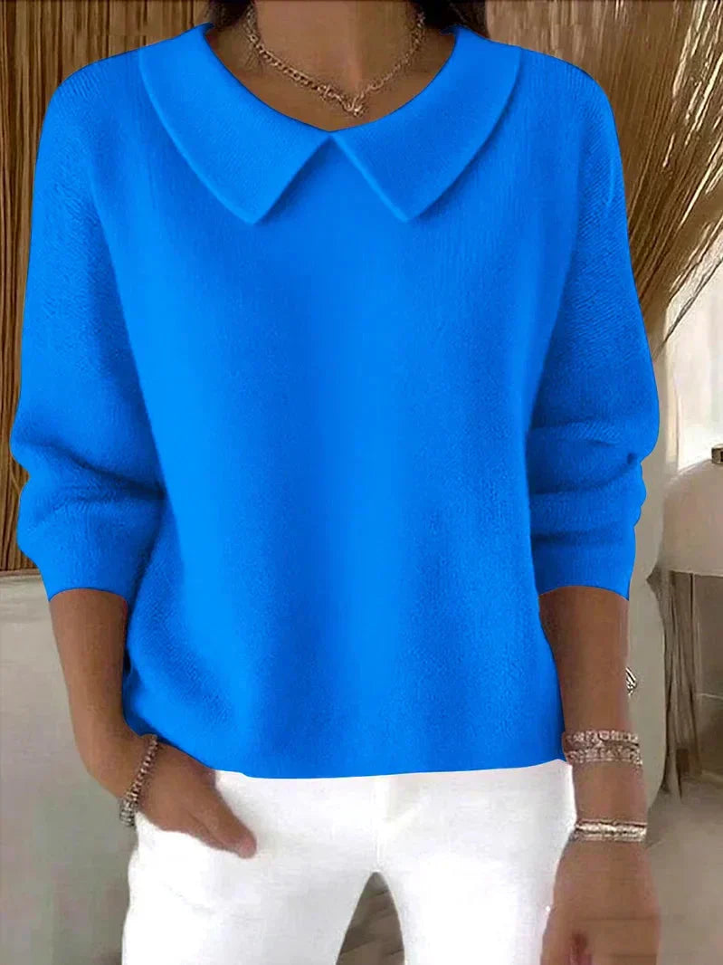 Women's long sleeve collared sweater with rounded collar and hip-length straight fit