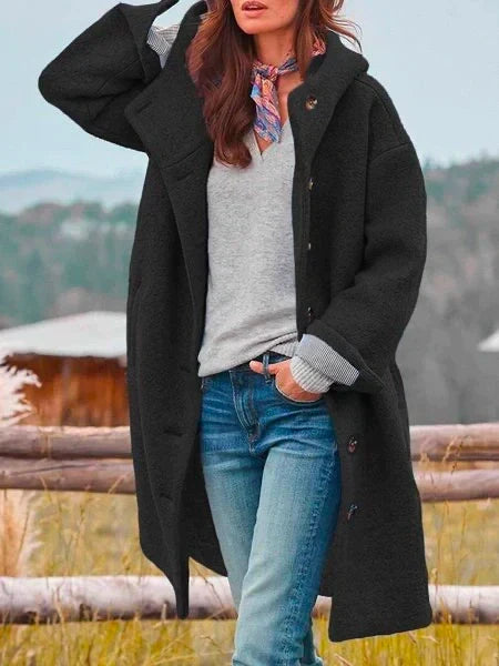 Women's hooded longline coat with button front, long sleeves and large pockets