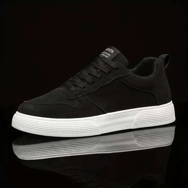 Low-top lace-up trainers with stitched panels and textured flat soles