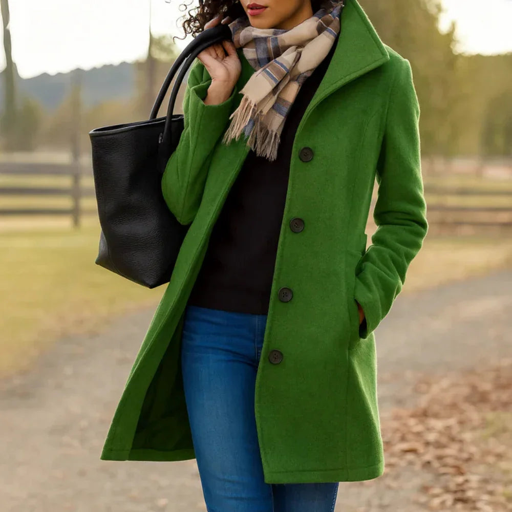Women's long button-front coat with shirt collar, long sleeves and side pockets