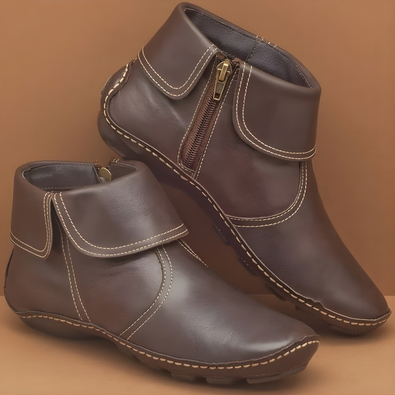 Ankle boots with foldover collars, side zips and flat soles