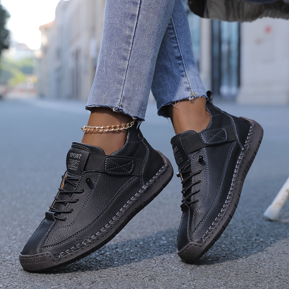 Women's lace-up high-top trainers with ankle strap and stitched panels