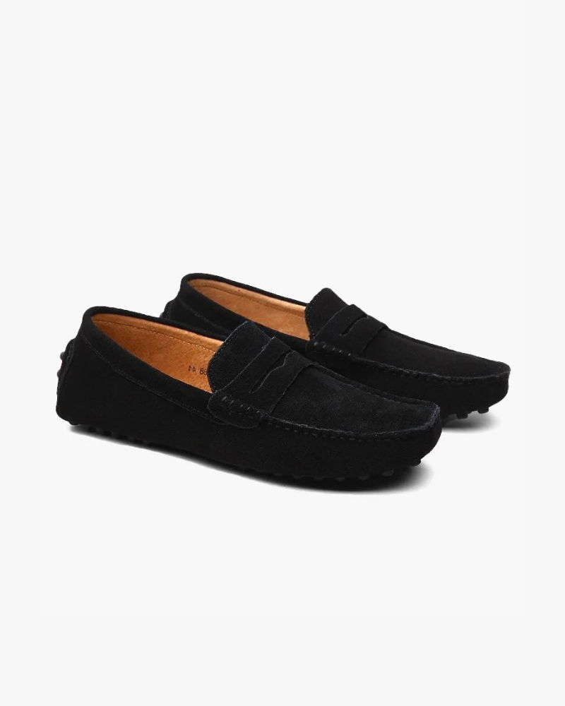 Men's penny loafers with moc toes, stitched trim and low flat soles