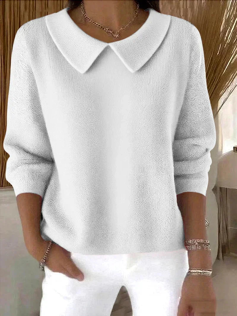 Women's long sleeve collared sweater with rounded collar and hip-length straight fit