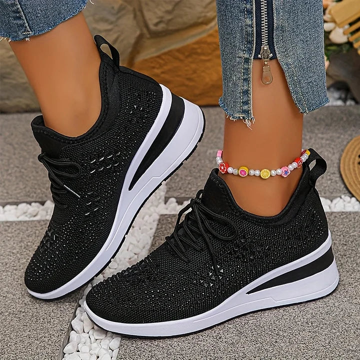 Women's lace-up mesh trainers with textured uppers and contrasting low-profile soles