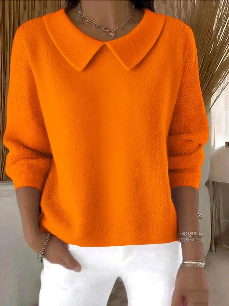 Women's long sleeve collared sweater with rounded collar and hip-length straight fit