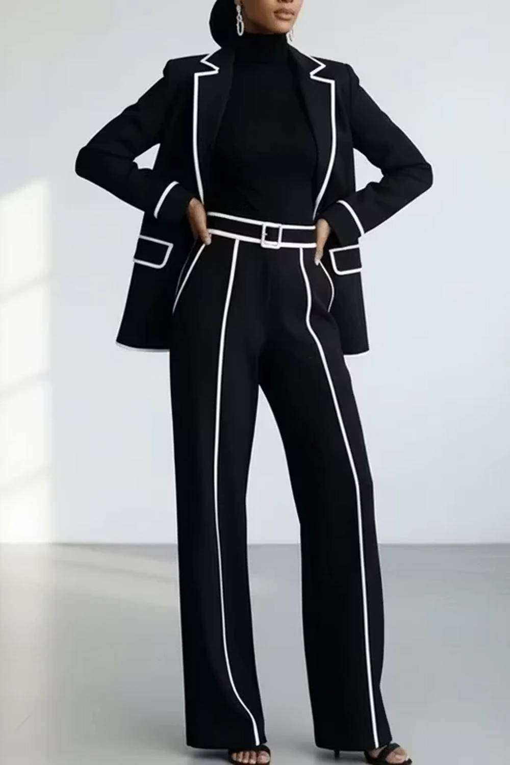 Women's two-piece trouser set with piped blazer and wide-leg trousers