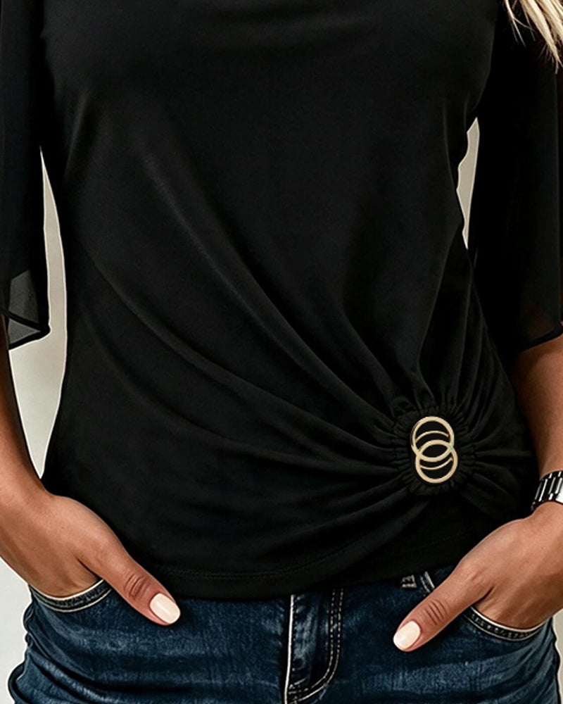 Women's black blouse with round neckline, sheer 3/4 sleeves and ruched ring waist detail
