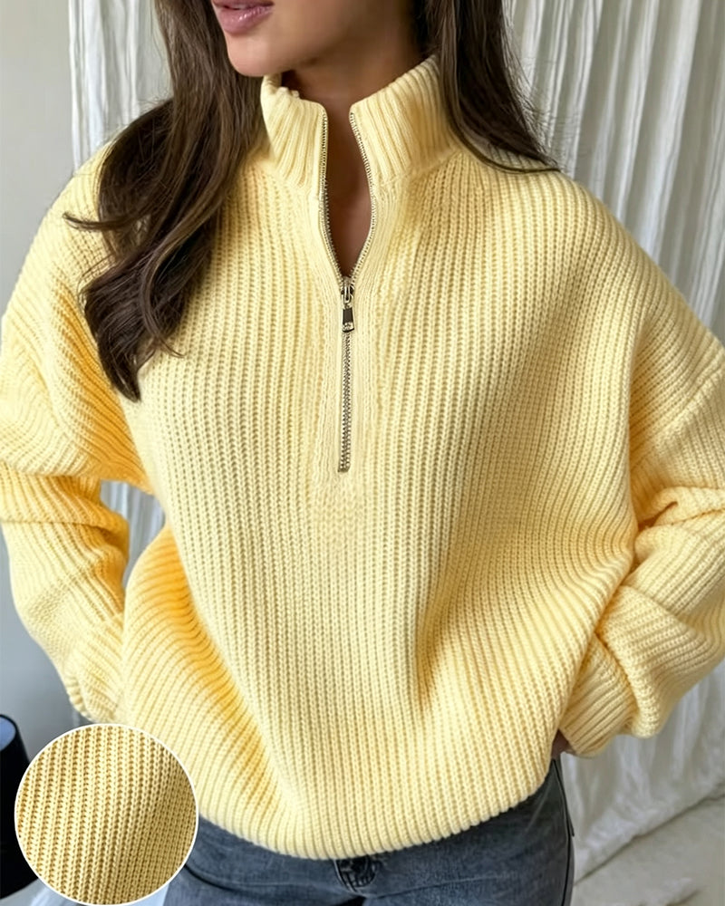 Women's yellow ribbed half-zip jumper with a funnel neck and long sleeves