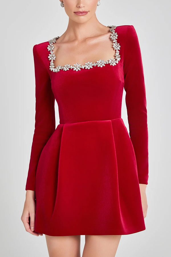 Women's velvet mini dress with square neckline, long sleeves and floral jewel trim