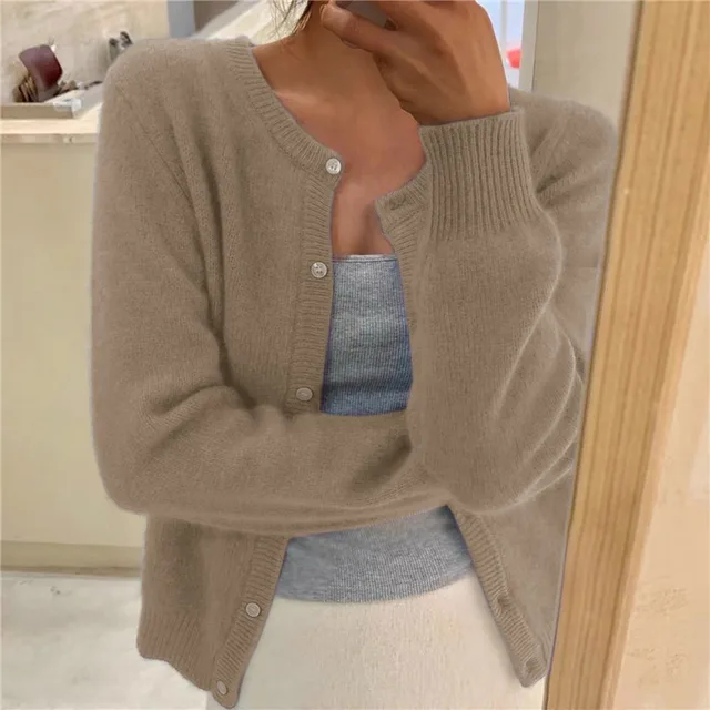 Women's relaxed button front knit cardigan with long sleeves and ribbed trims