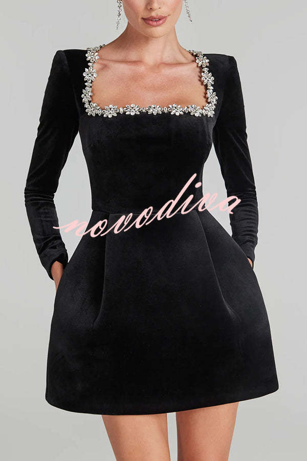 Women's velvet mini dress with square neckline, long sleeves and floral jewel trim