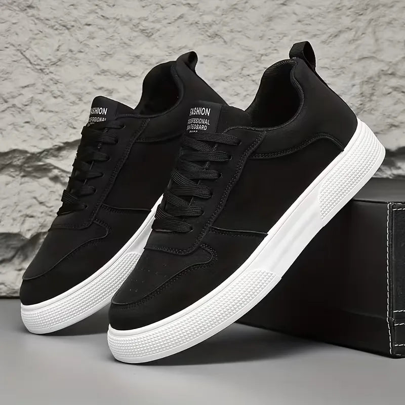 Low-top lace-up trainers with stitched panels and textured flat soles