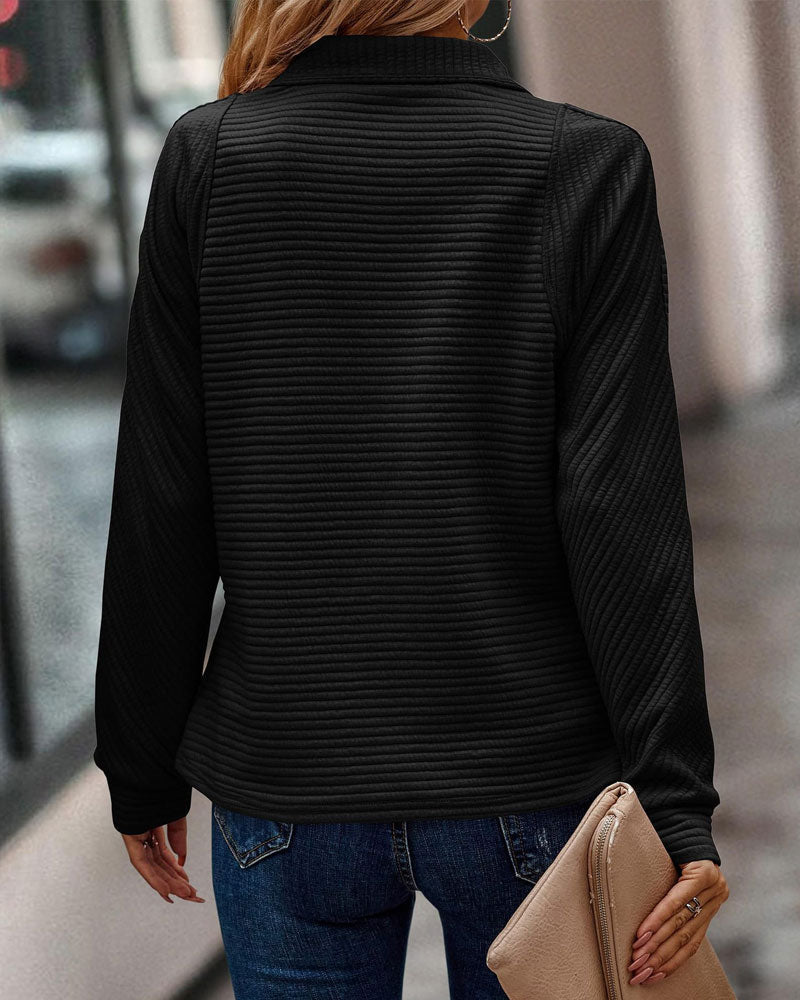 Women's ribbed quarter-zip sweatshirt with a high stand collar and long sleeves