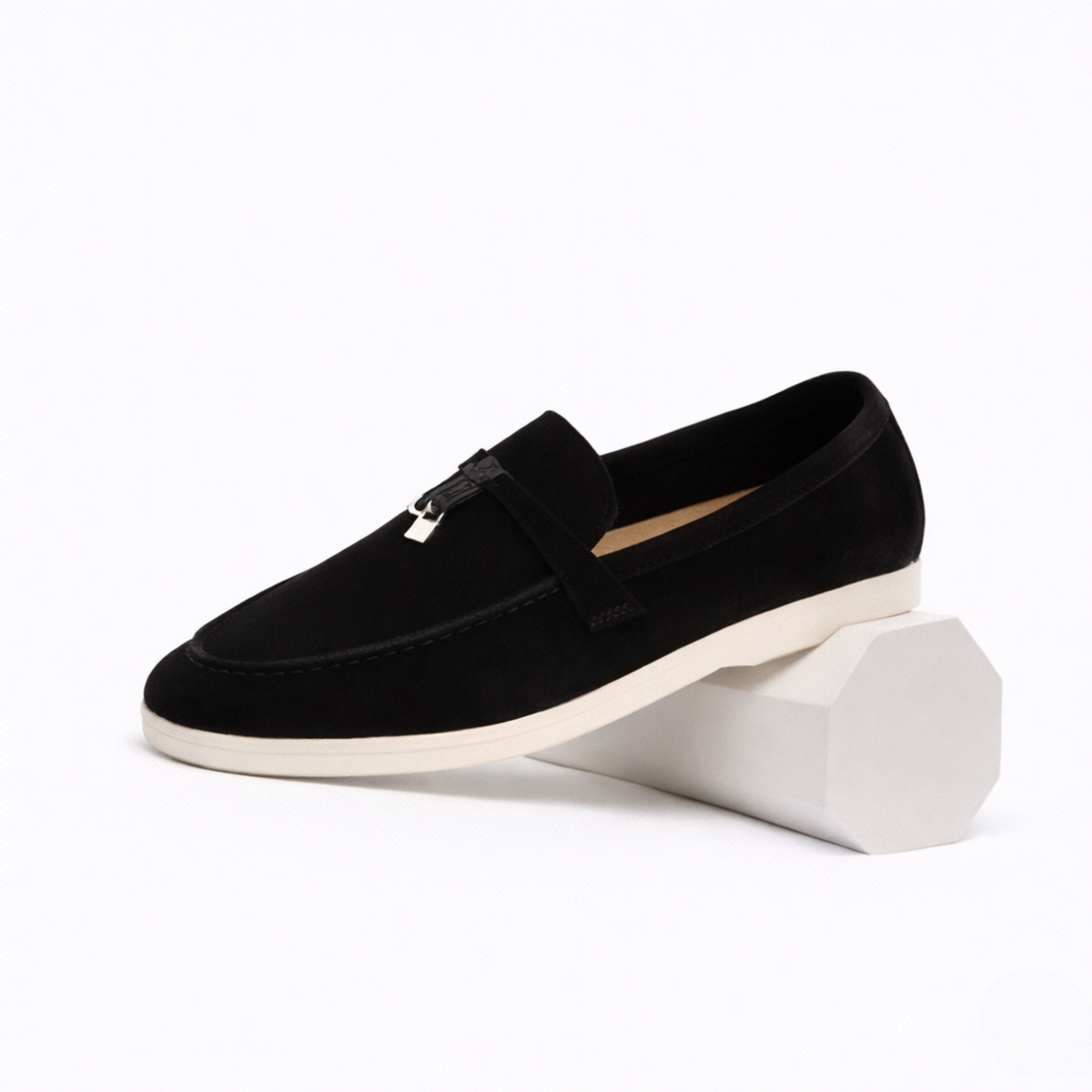 Women's slip-on loafers with metal vamp trim and flat soles