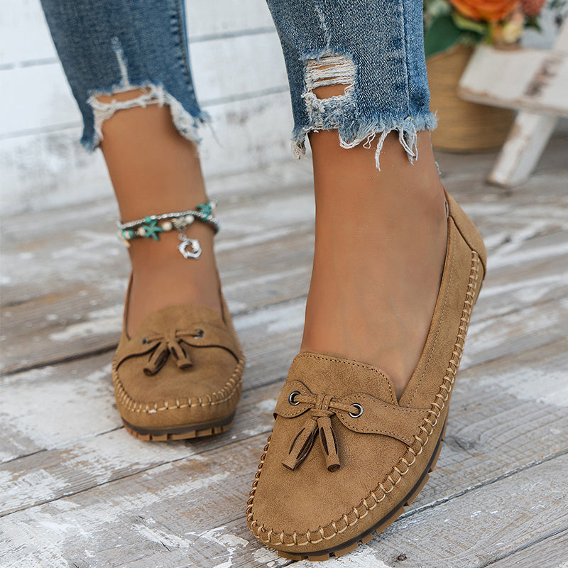 Women's moc toe loafers with lace detail and flat heels