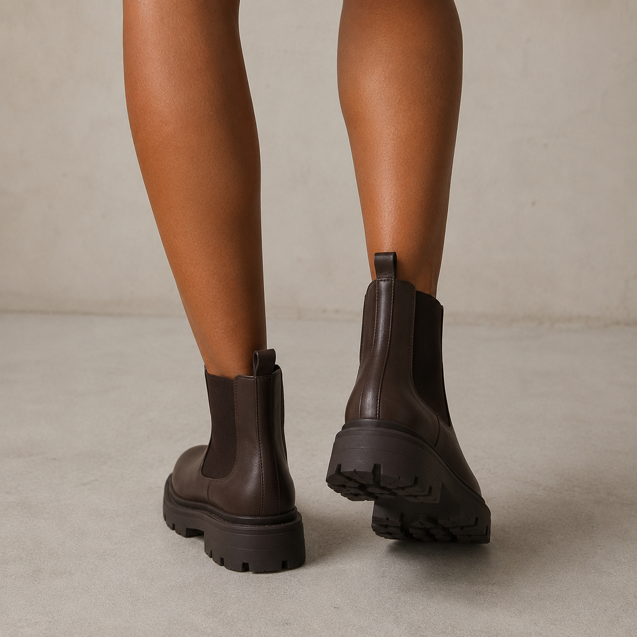 Women's Chelsea boots with elastic side panels and chunky lug soles