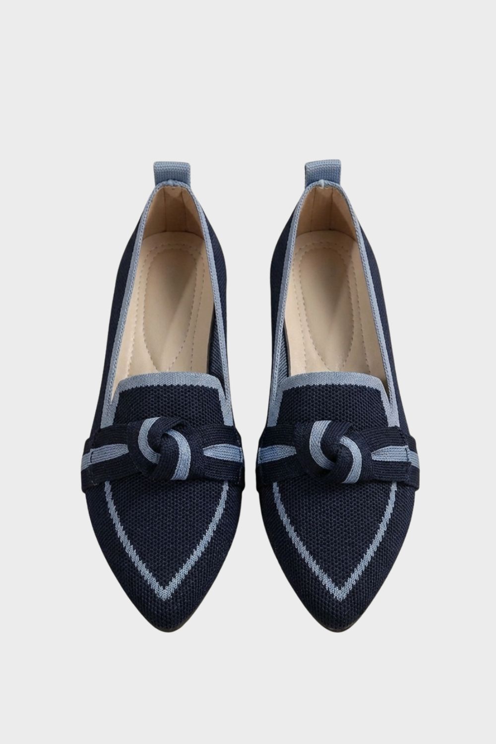 Women's pointed-toe loafers with bow trim and contrast edging