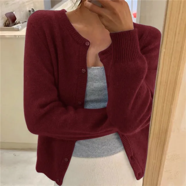 Women's relaxed button front knit cardigan with long sleeves and ribbed trims