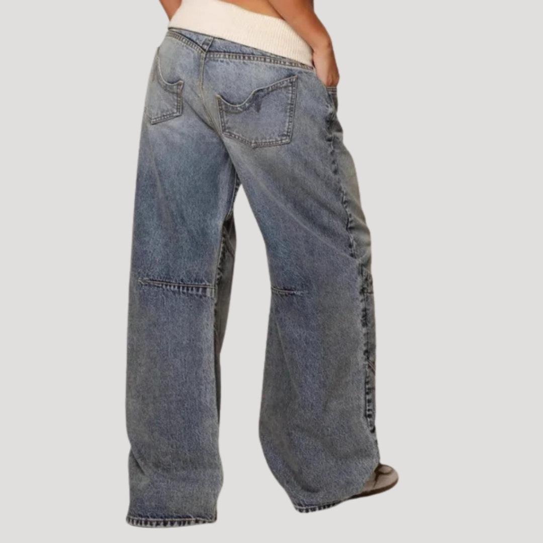 Women's light blue wide-leg jeans with curved darker panel detailing