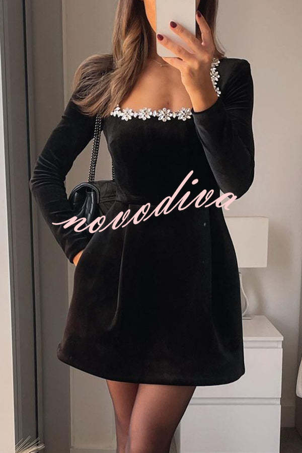 Women's velvet mini dress with square neckline, long sleeves and floral jewel trim