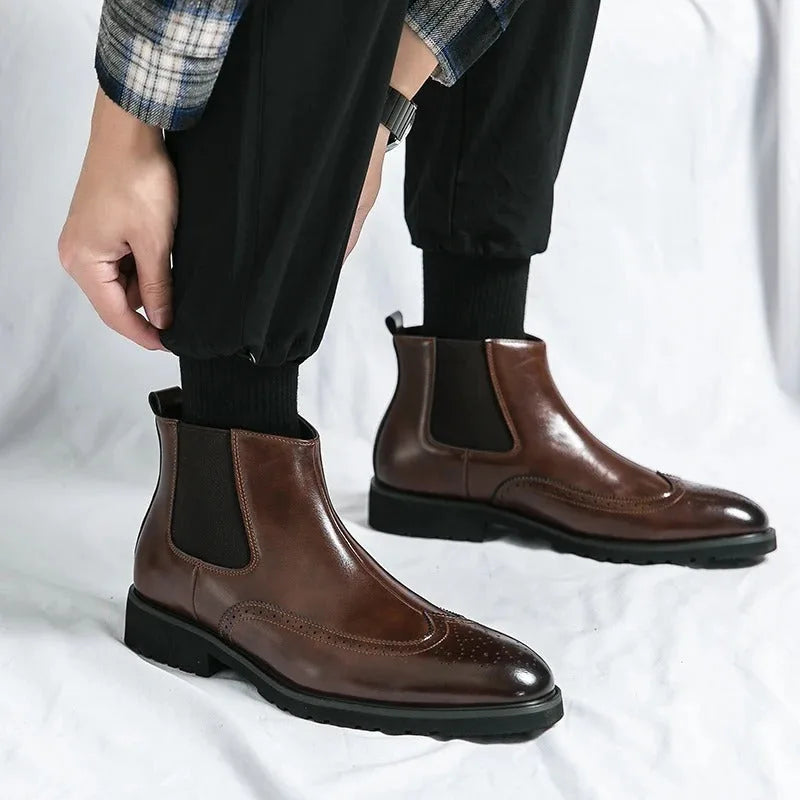 Chelsea boots with brogue detailing, elastic side panels and lug soles