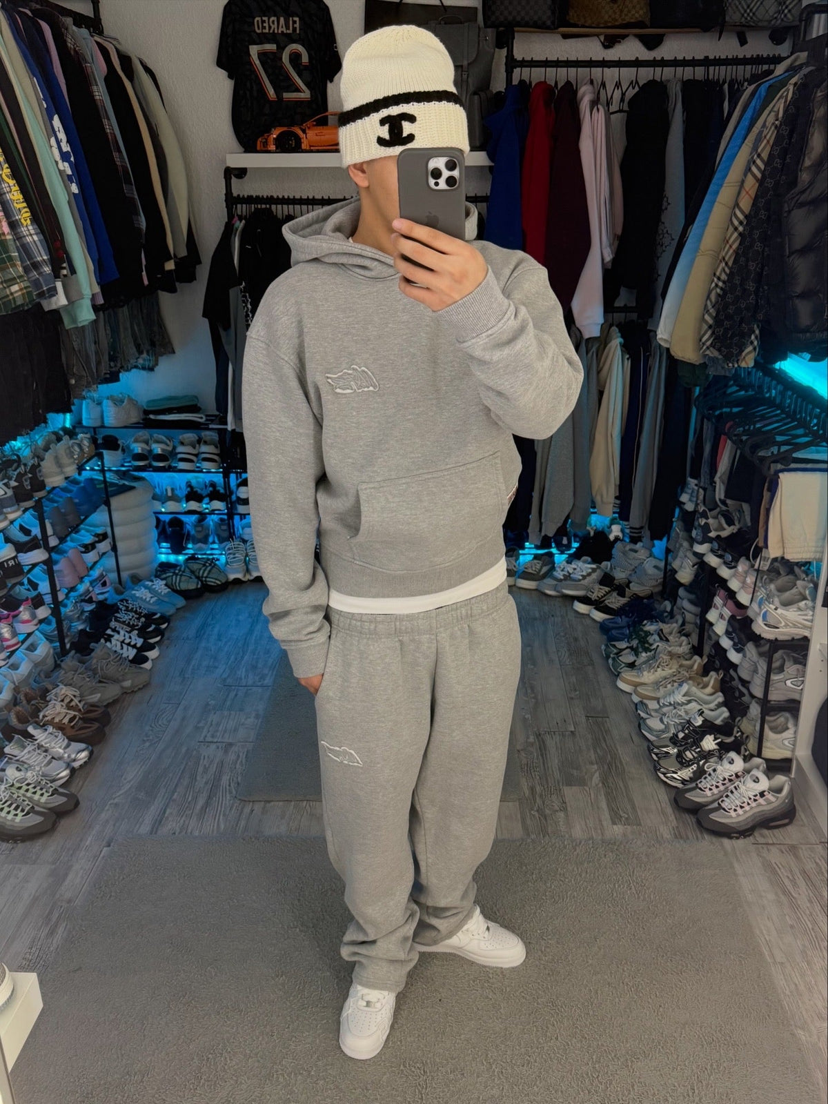 Grey unisex pullover hoodie with hood, long sleeves and kangaroo pocket