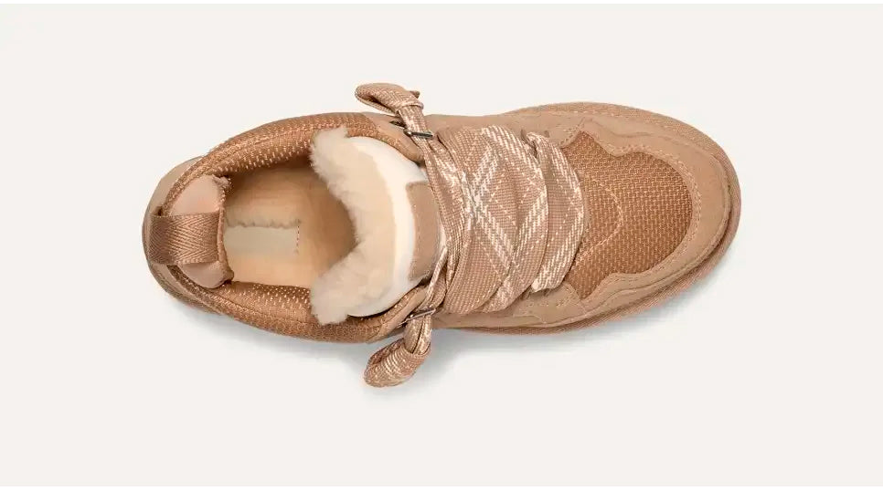 Beige women's high-top trainers with patterned laces and plush ankle trim