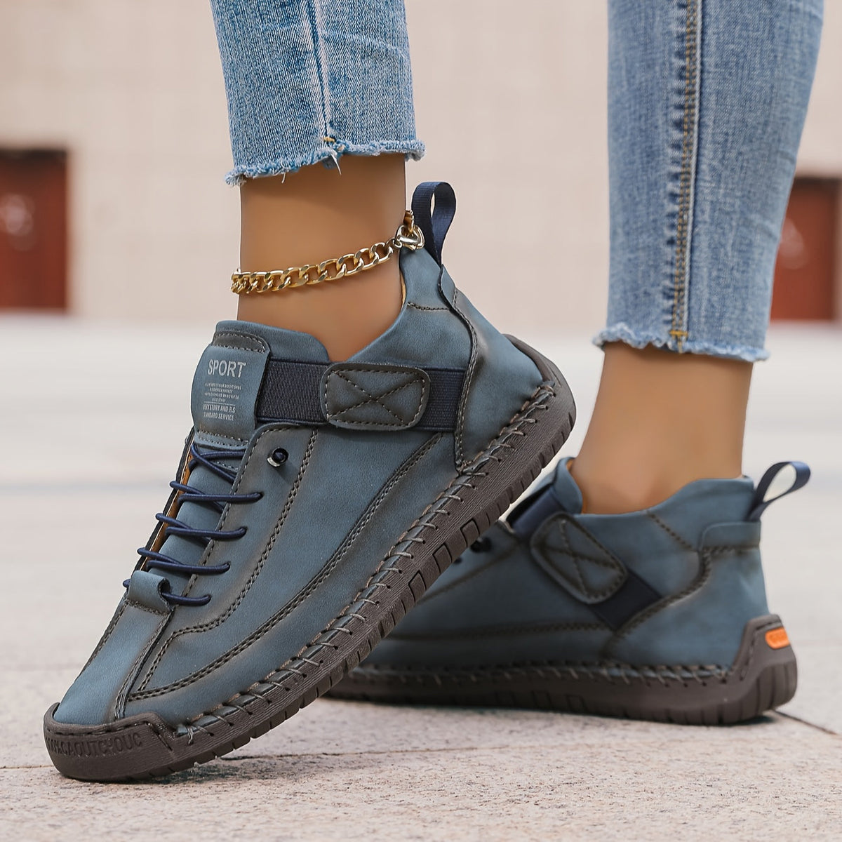 Women's lace-up high-top trainers with ankle strap and stitched panels