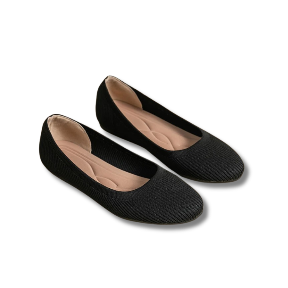 Women's ribbed ballet flats with rounded toes and contoured insoles