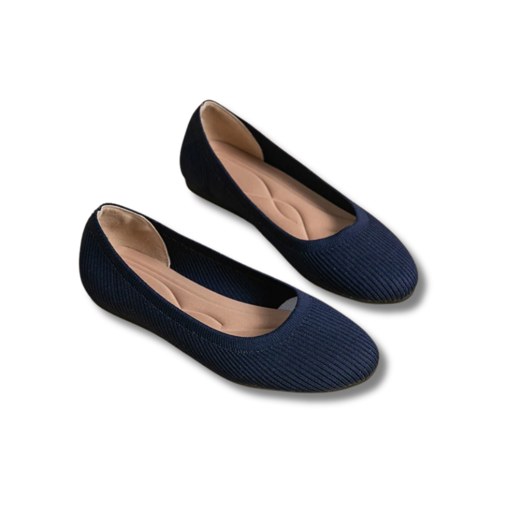 Women's ribbed ballet flats with rounded toes and contoured insoles
