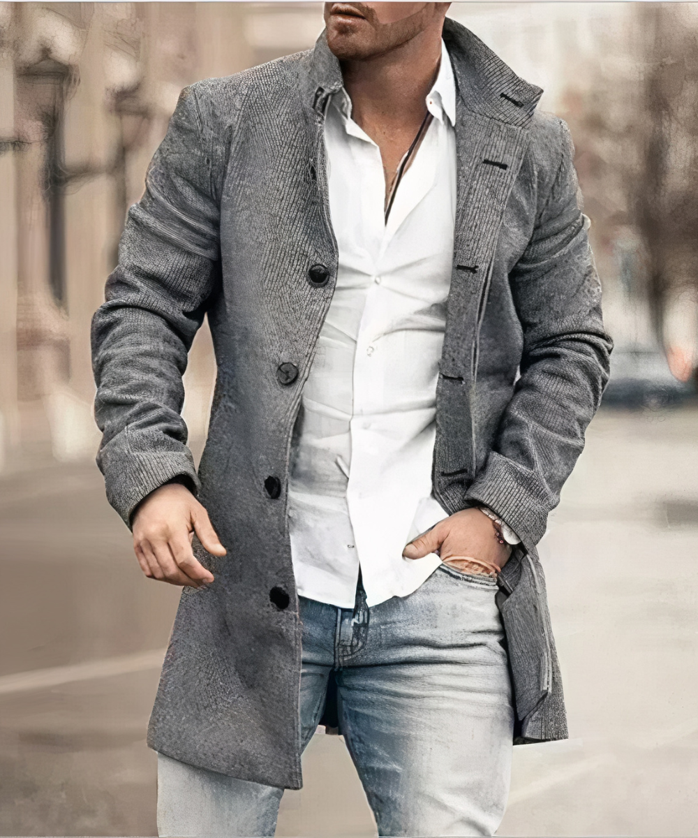 Men's longline trench coat with stand collar, button front and textured panel detailing