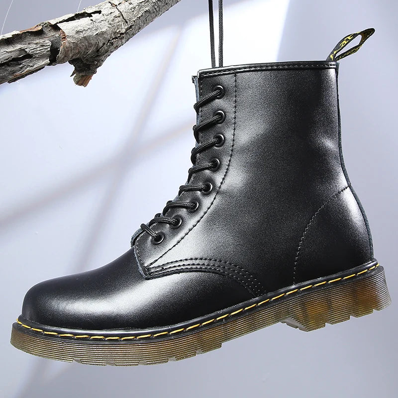 Women's lace-up combat boots with round toes and chunky ribbed soles