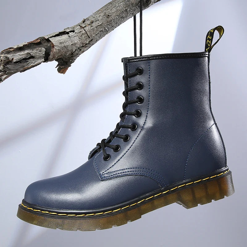 Women's lace-up combat boots with round toes and chunky ribbed soles